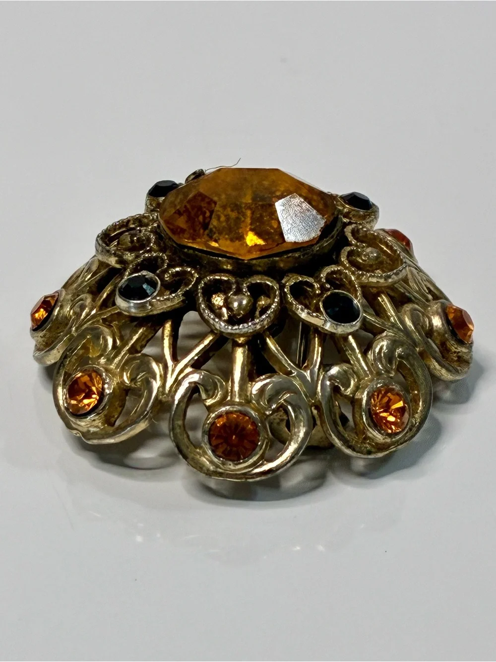 Coro Gold-Tone Heart Shaped Ornate Filigree Brooch with Amber and Black Stones